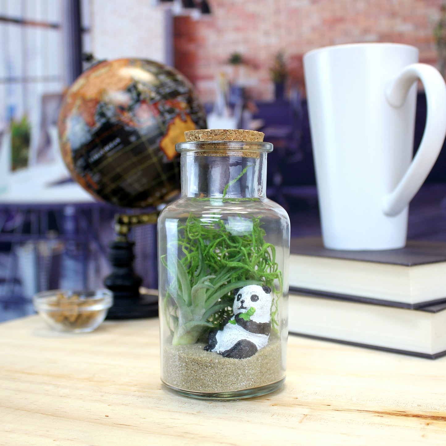 Miniature Sitting Panda Eating Bamboo